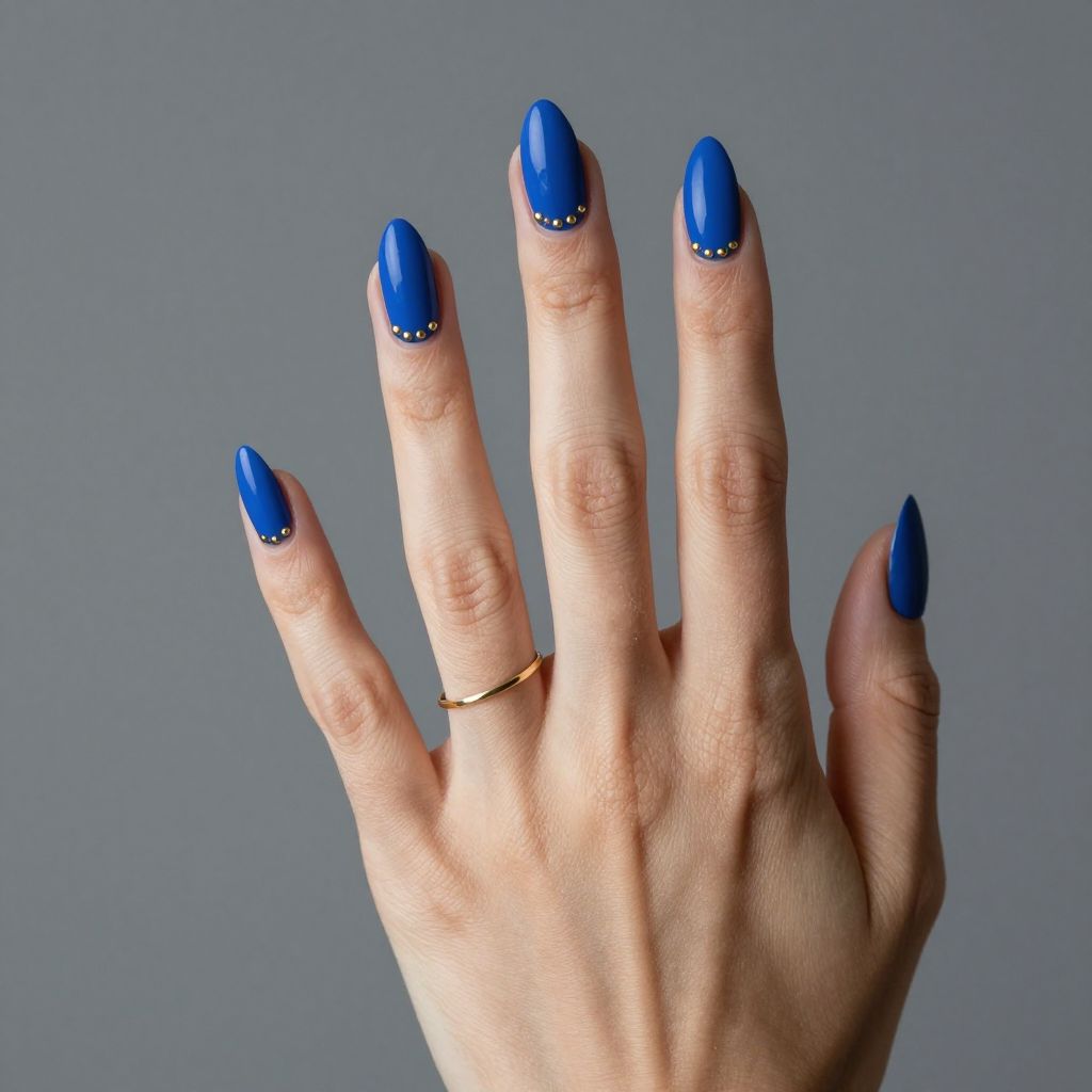 Royal matte blue nails with gold studs