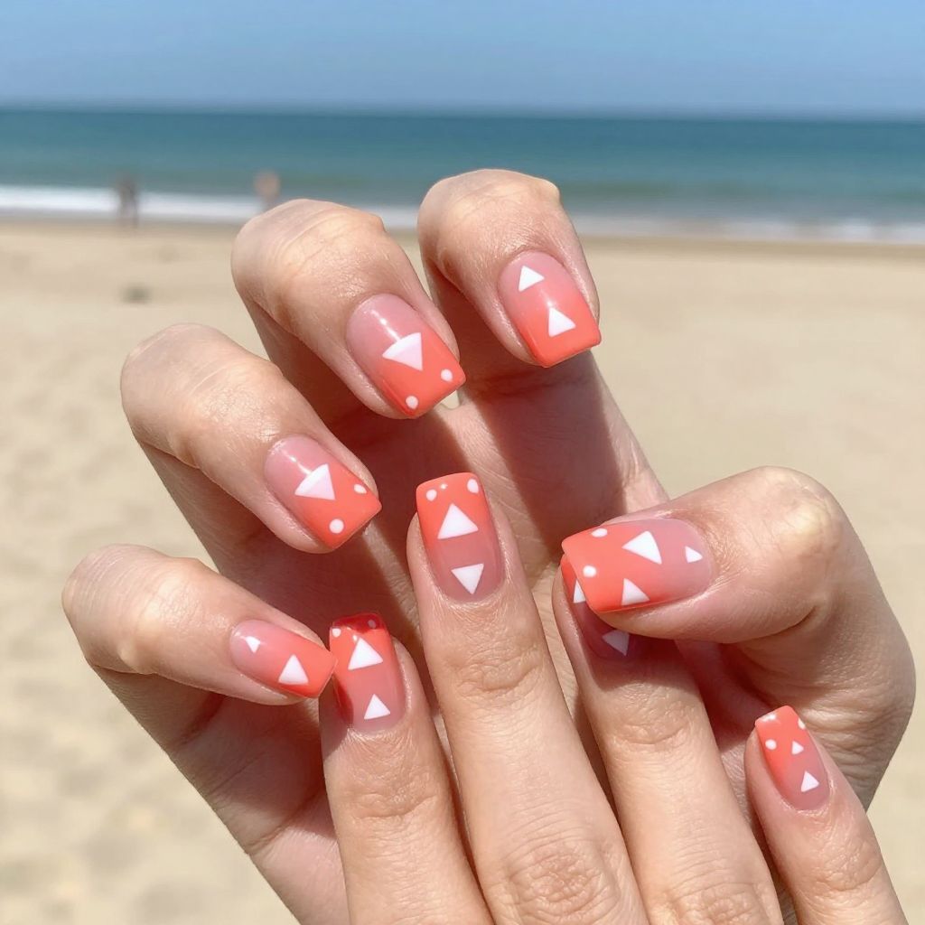 Short nails Coral with Geometric White Triangles