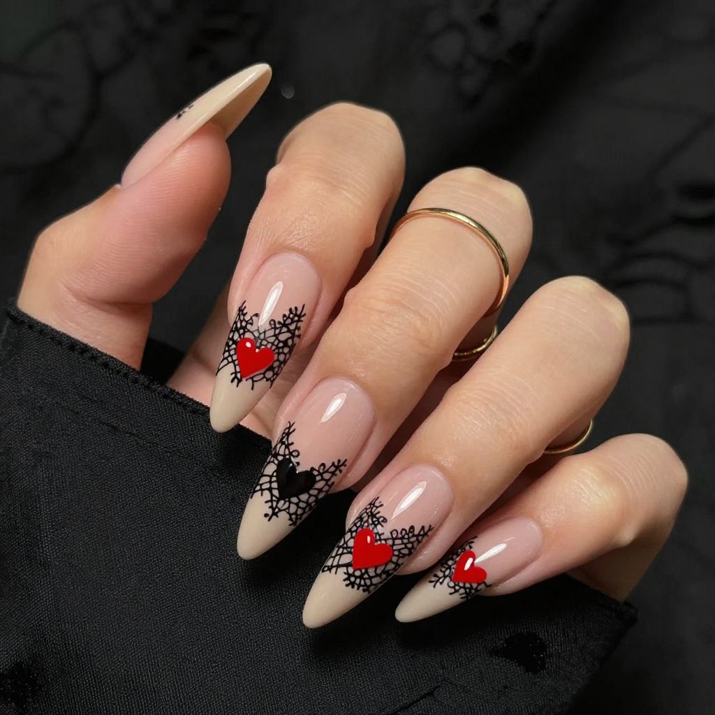 Black lace stiletto nails with red heart accent